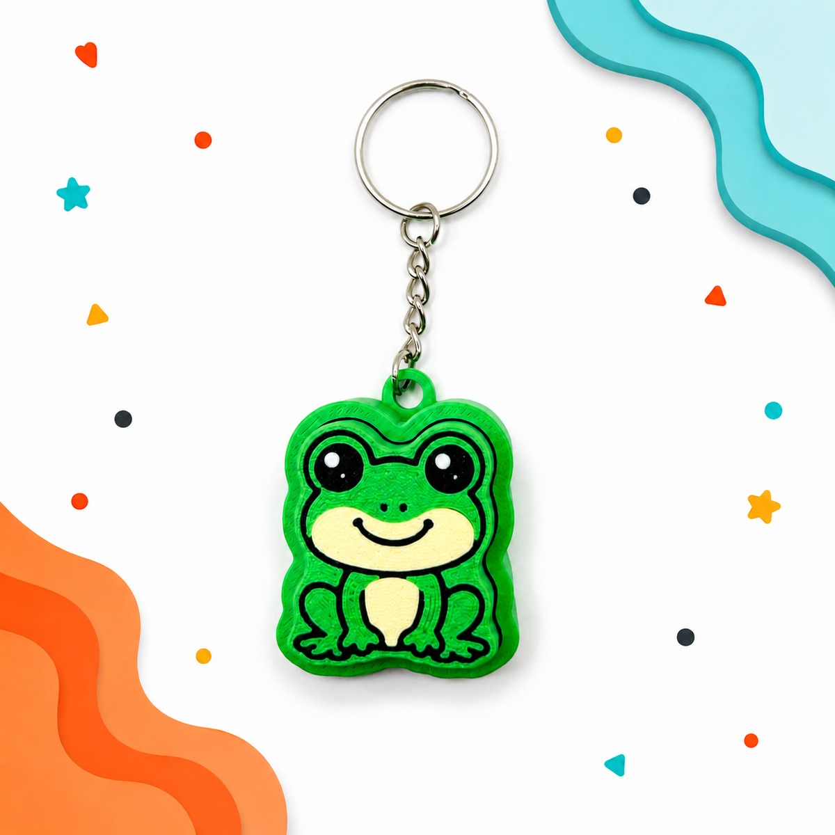 Green frog fidget clicker keychain with colorful wavy background accents