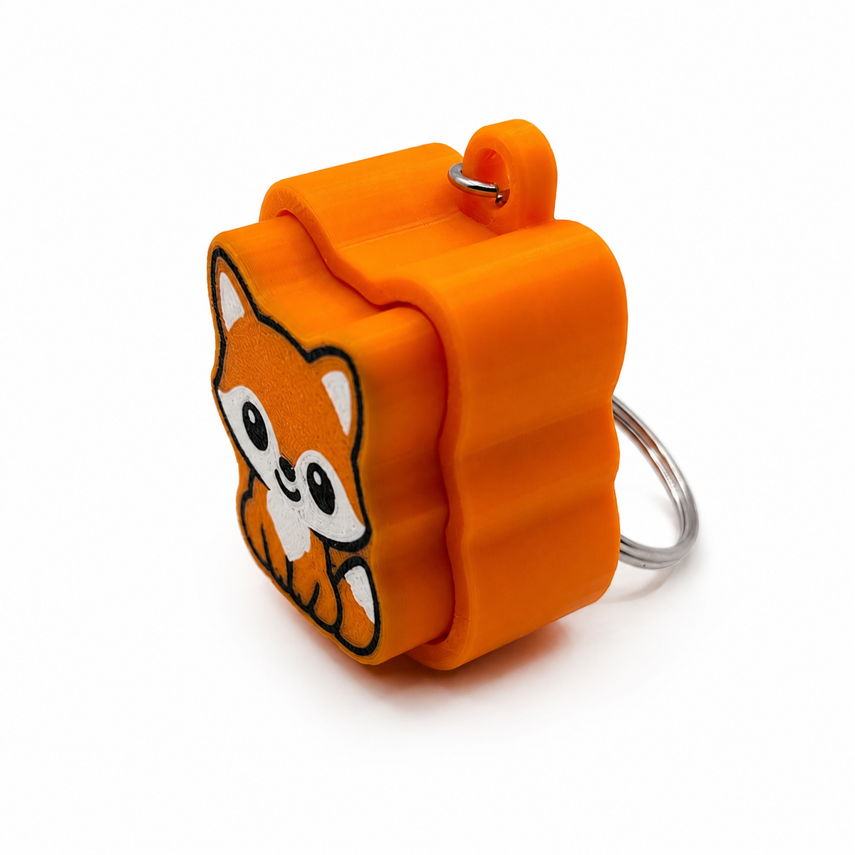 Side view of an orange 3D-printed fox clicker keychain showing its layered body and keychain loop