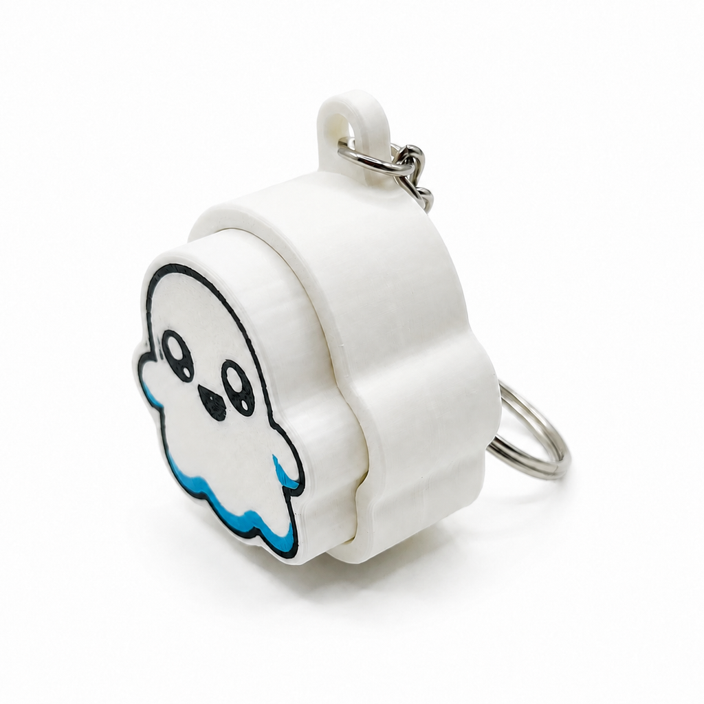 Side view of a white 3D-printed ghost clicker keychain showing its layered body and keychain loop