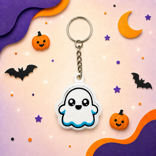 White ghost fidget clicker keychain with pumpkins, bats, stars and colorful Halloween accents