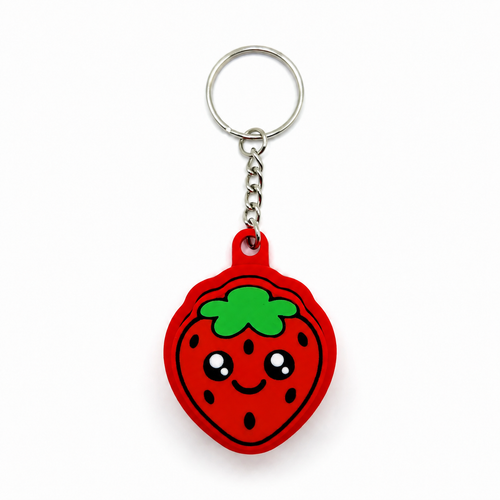 Red strawberry fidget clicker keychain with a green leafy top, black seeds, sparkling eyes, cheerful smile, and silver keychain hardware on white.